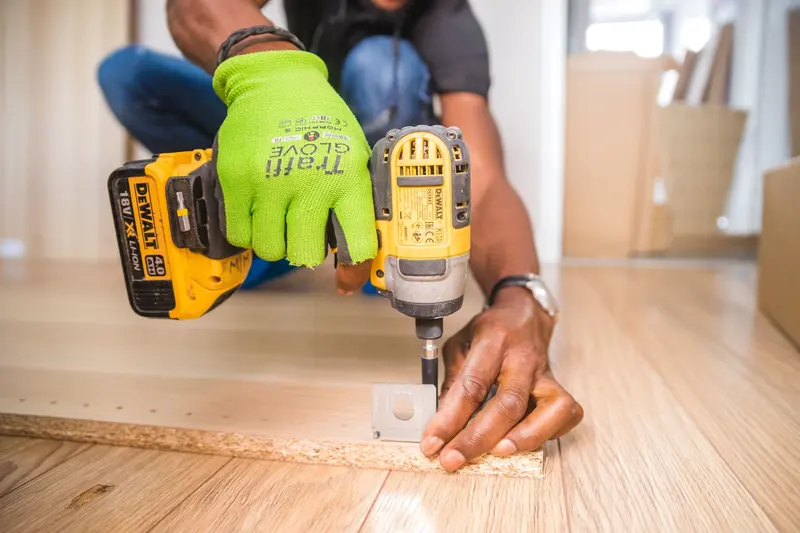 Sockets, extensions and a ratchet laid out on a workbench
